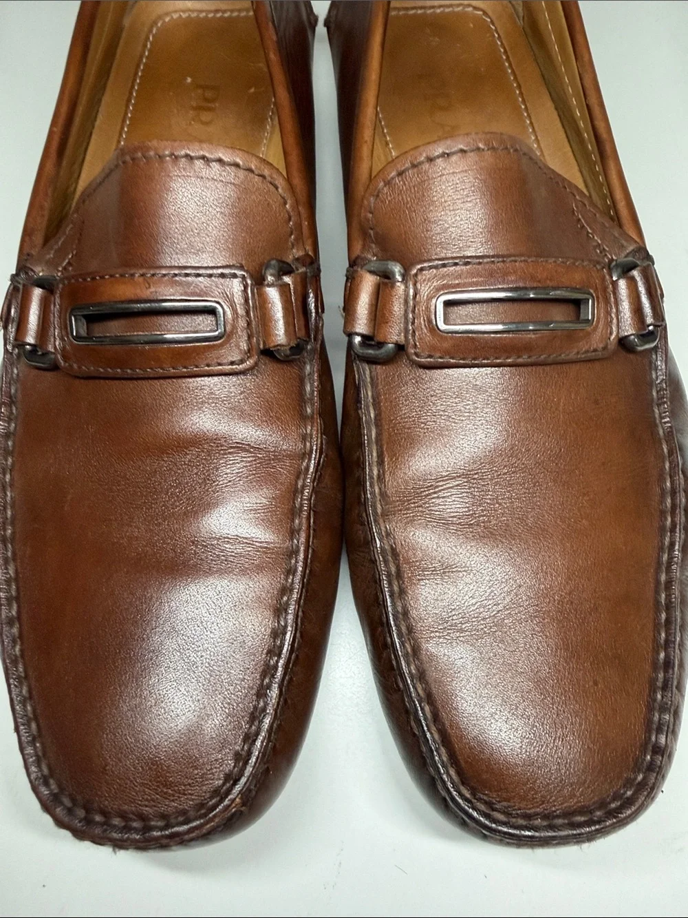 Prada classic moc-toe design silver-tone metal bit  driving loafers Men's 9